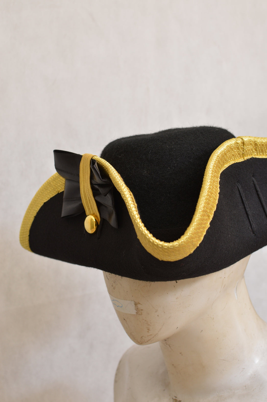 Handcrafted military tricorn hat in black wool with gold trim