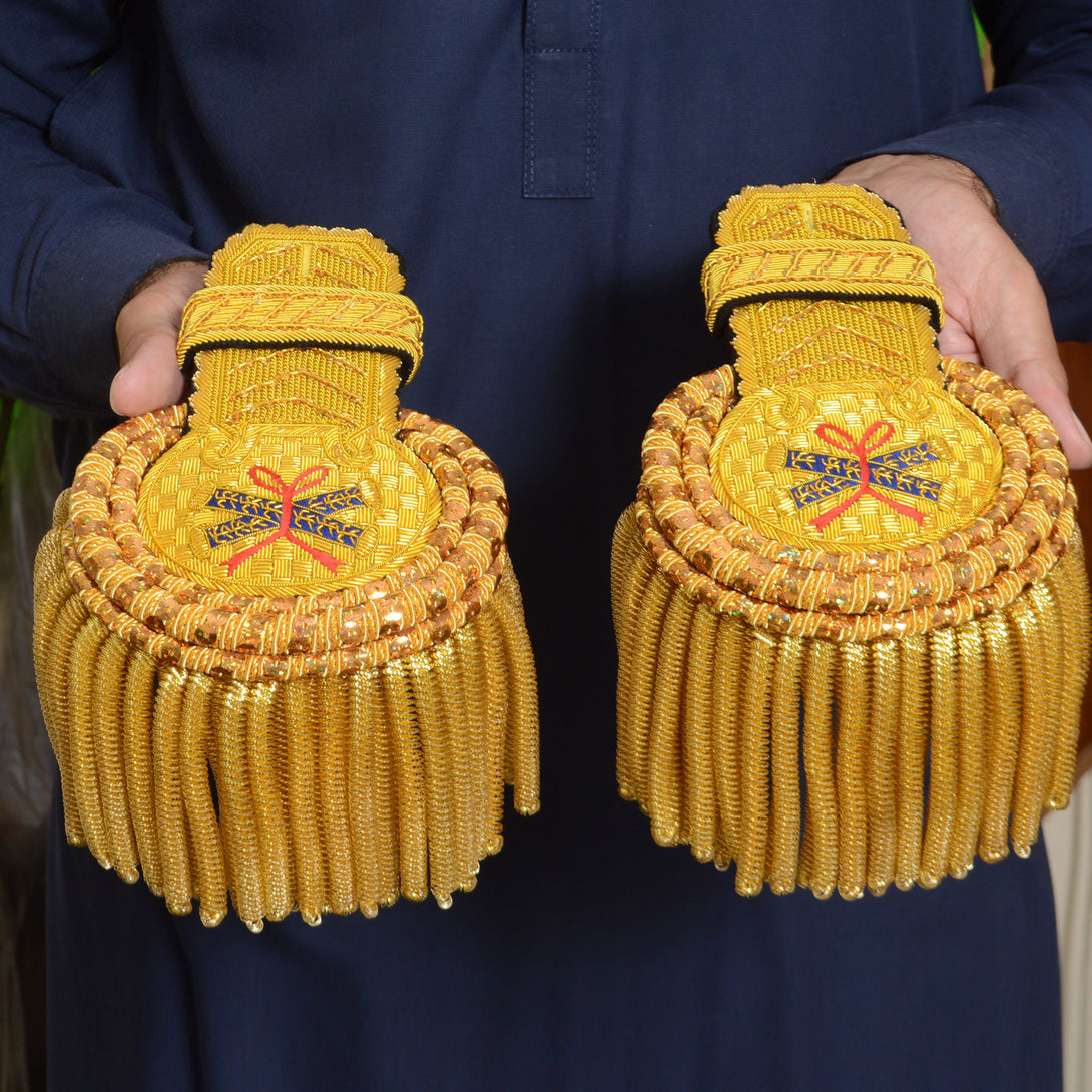 Decorative gold shoulder epaulettes for ceremonial dress